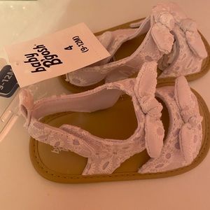 Eye knot now baby sandals. Very soft!!!